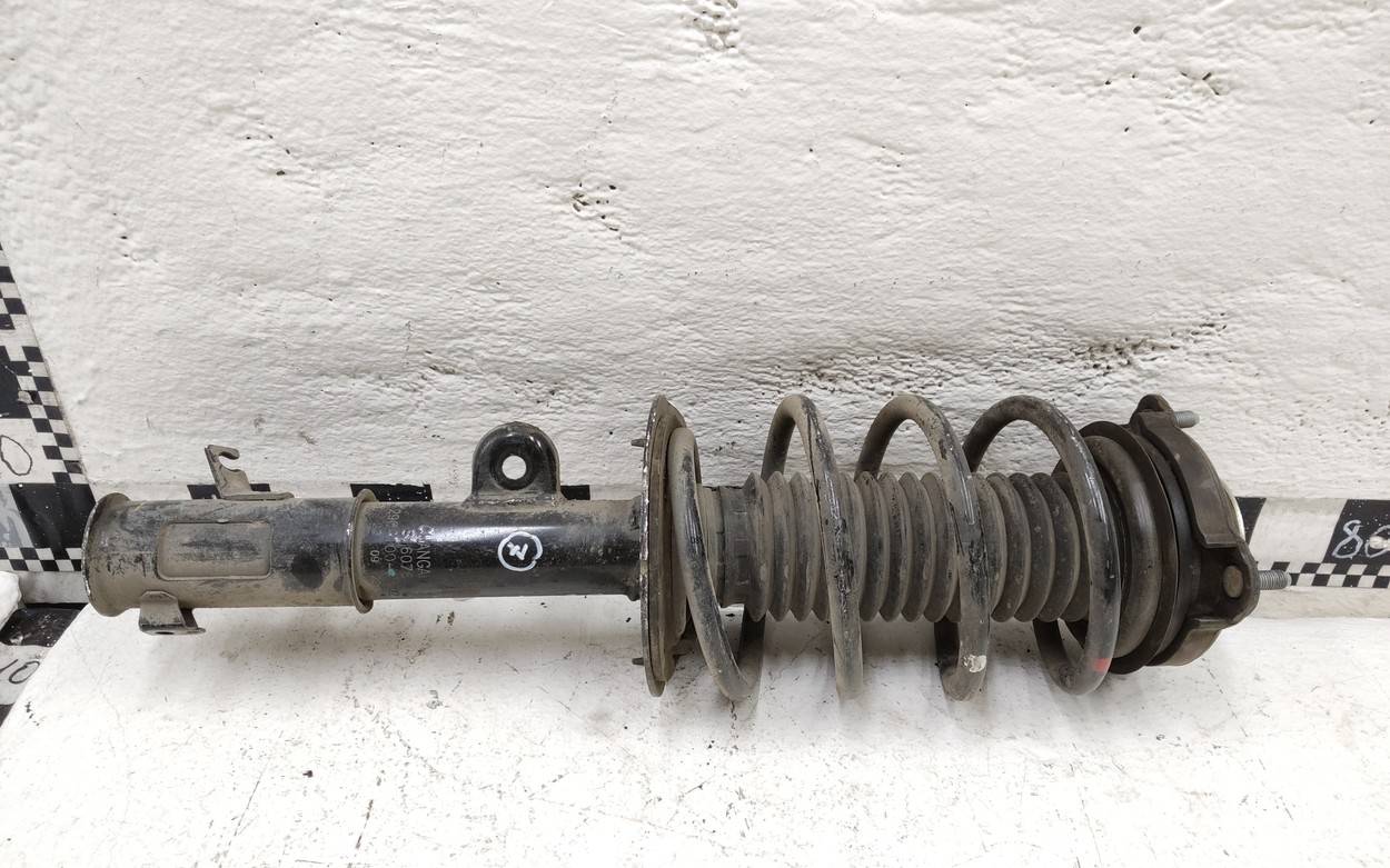 Амортизатор передний левый