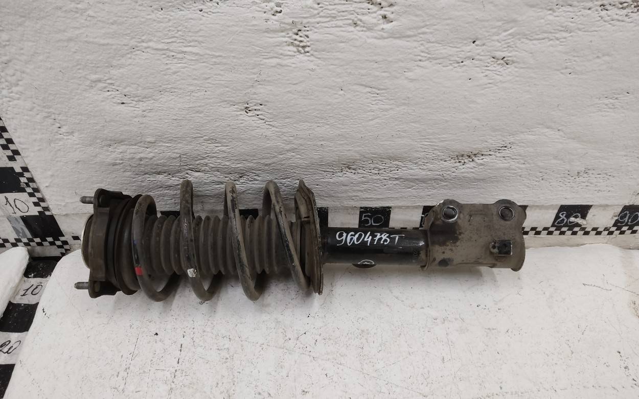 Амортизатор передний левый