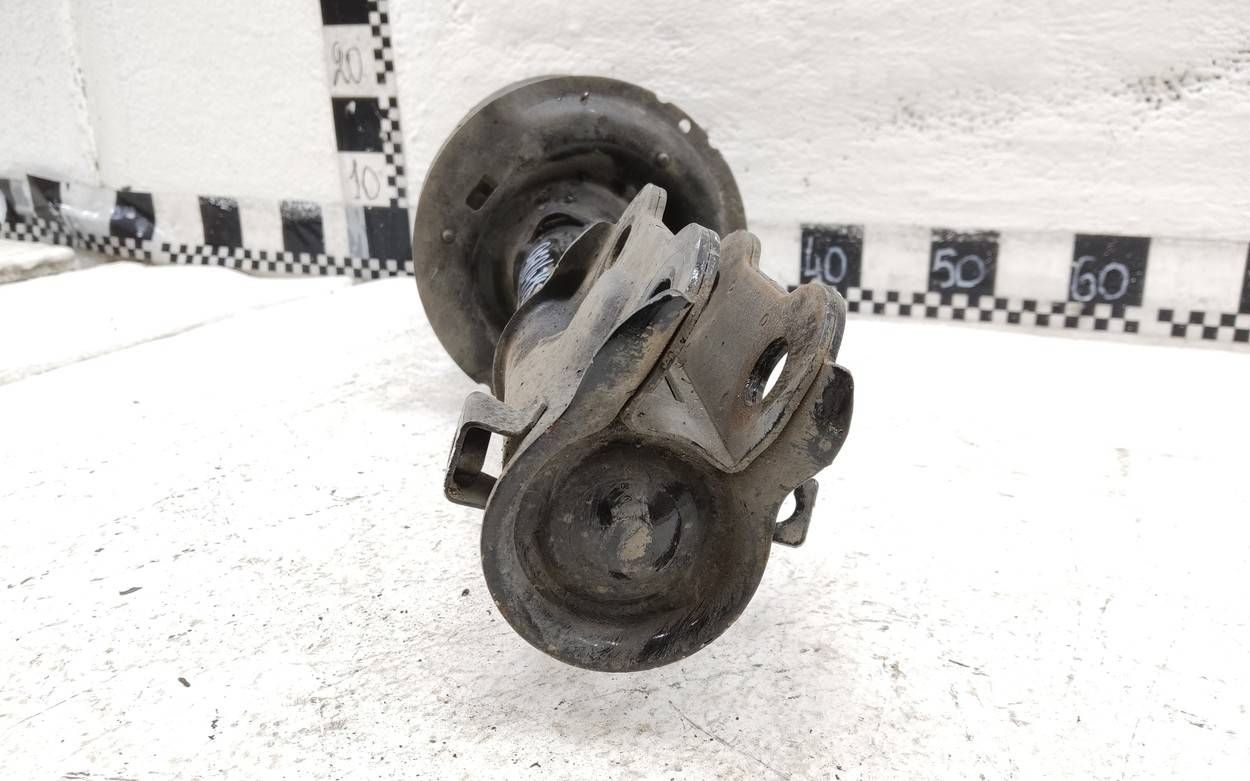 Амортизатор передний левый