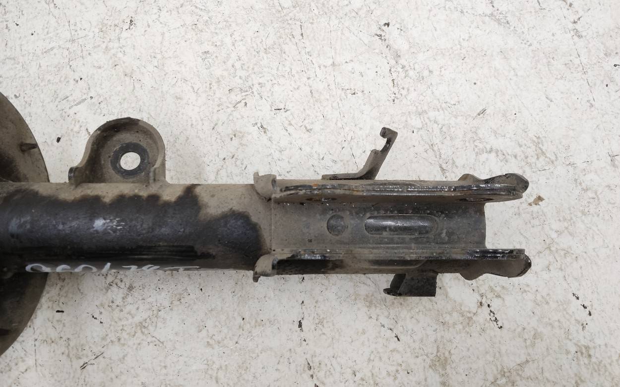 Амортизатор передний левый