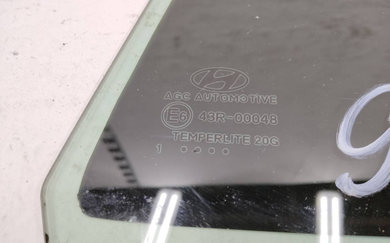 Стекло кузовное глухое левое