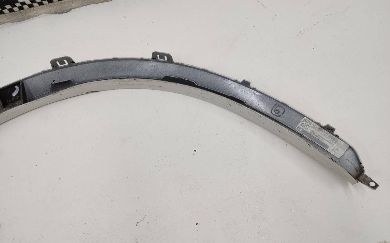 Накладка переднего крыла левого