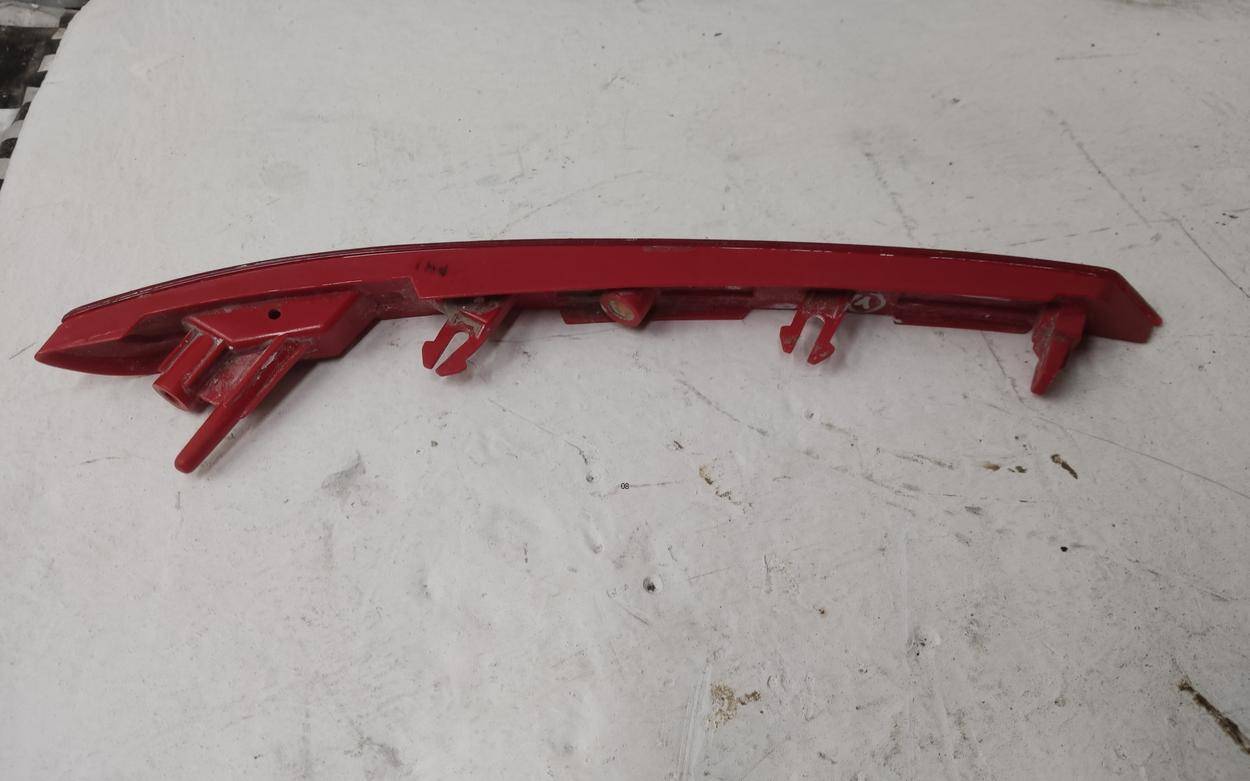 Отражатель в бампер задний левый