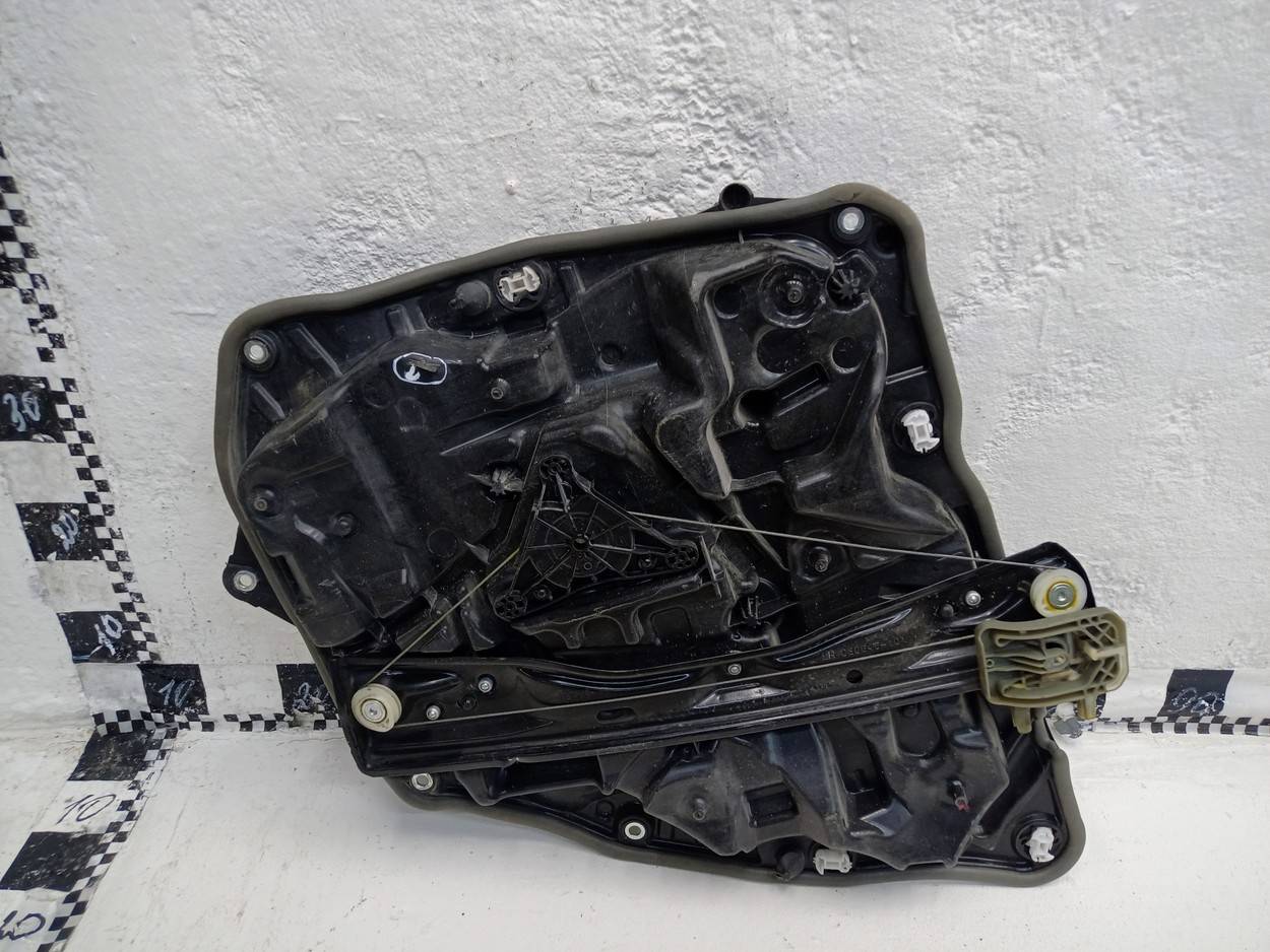 Стеклоподъемник электр. задний левый