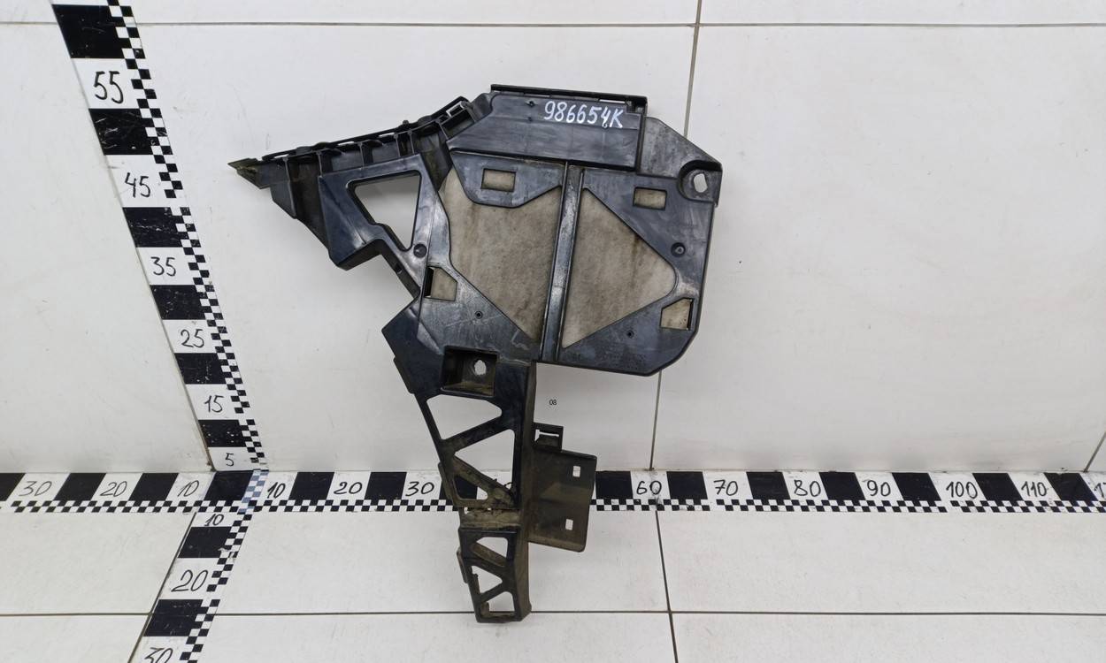 Кронштейн заднего бампера левый