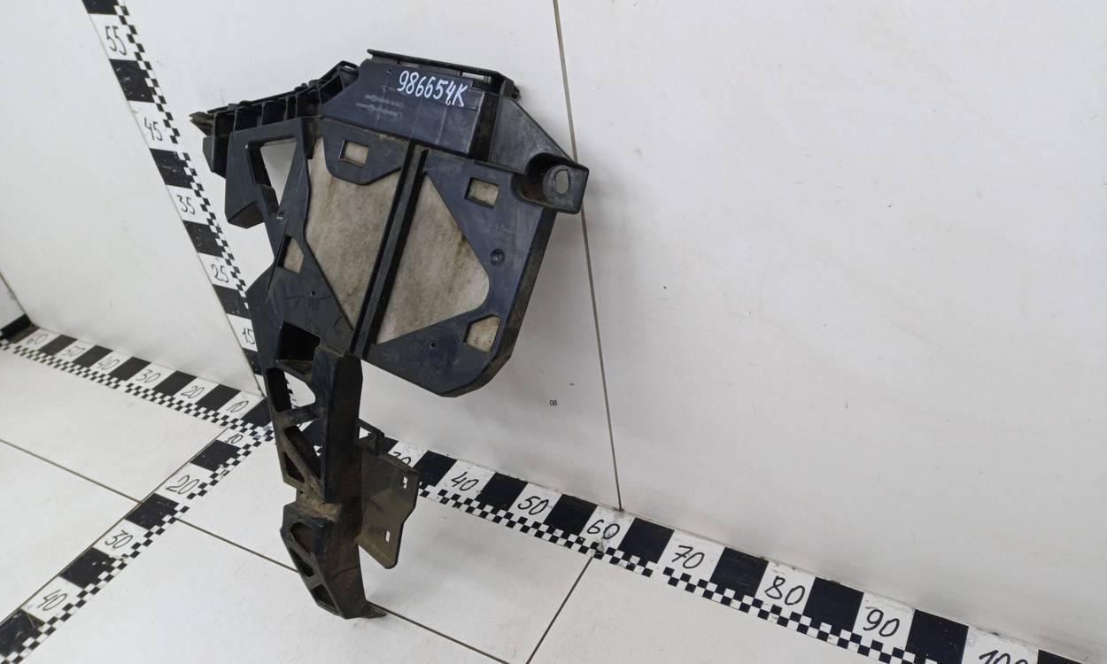 Кронштейн заднего бампера левый