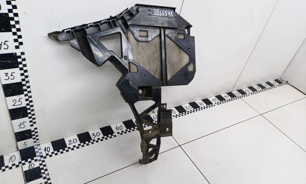 Кронштейн заднего бампера левый